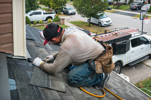 Professional Flat Roof Repair technician working in Byfield, MA